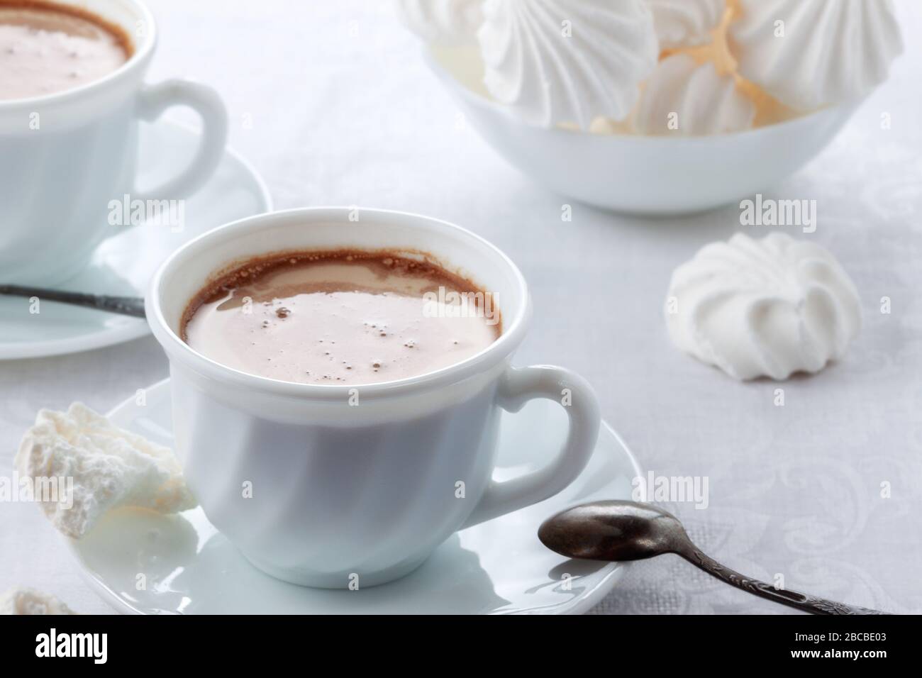 A cup of fresh coffee with cream and a gentle, airy Bizet Stock Photo