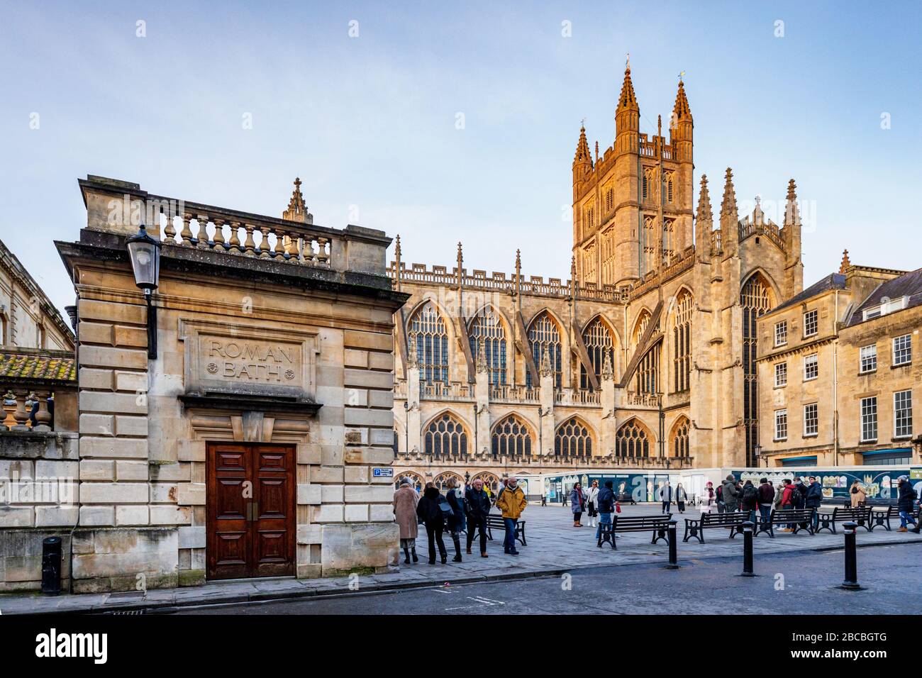 Old entrance to the Roman Baths with Bath Abbey, Bath, Somerset, England, UK Stock Photo