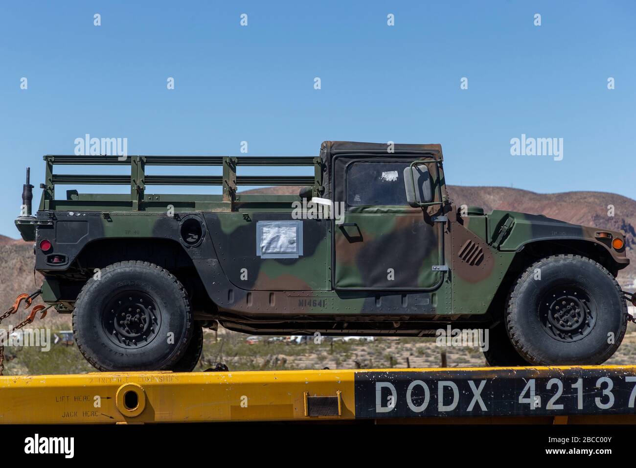 A military vehicle is transported to Marine Corps Logistics Base