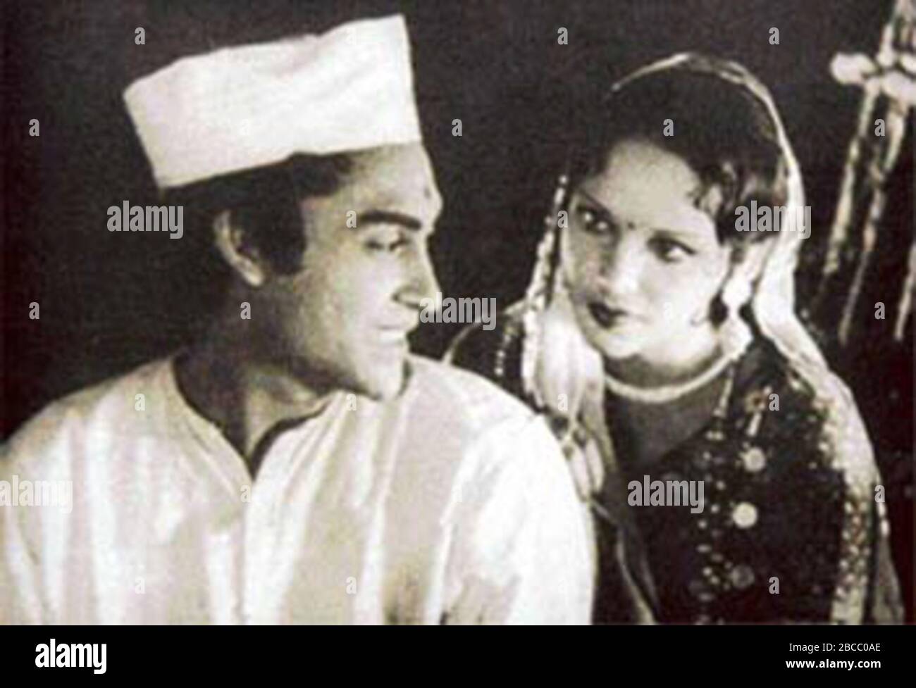 "English Devika Rani and Ashok Kumar in a scene from the 1936 film