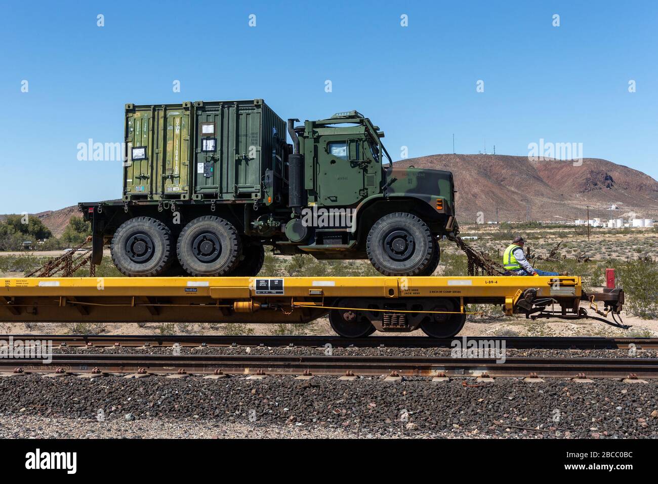 A military truck is transported to Marine Corps Logistics Base Barstow