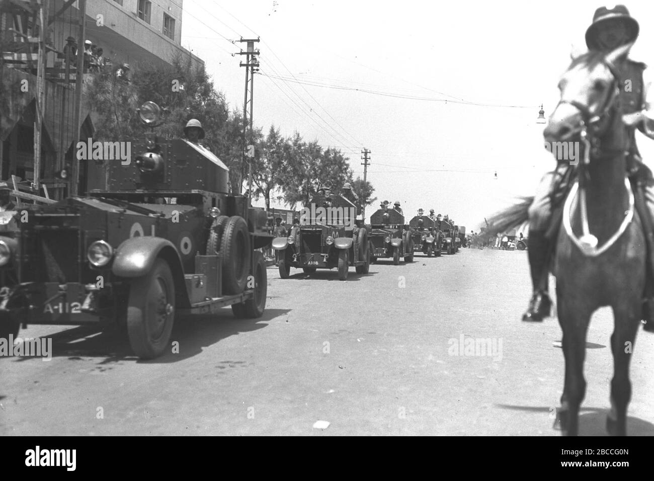 English British Armoured Vehicles Parading Through Allenby Street In Tel Aviv In Honor Of The Silver Jubilee Of King George V O O O U O U E O O O O U E O E O U U C I O O O U U C O U E U