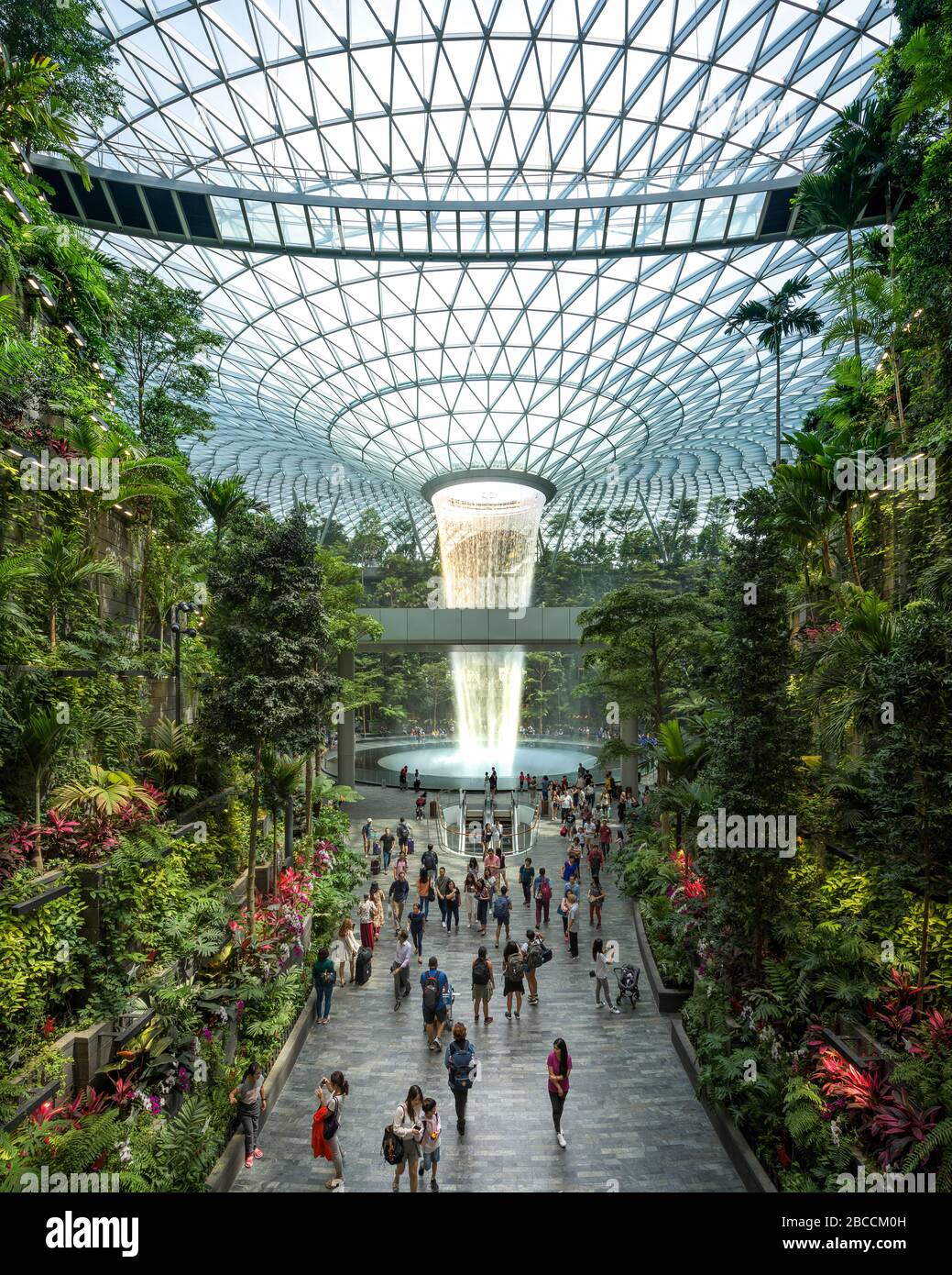 Singapore-30 Aug 2019: Jewel Changi Airport is a new terminal building under a glass dome, with indoor waterfall and tropical forest, shopping malls a Stock Photo