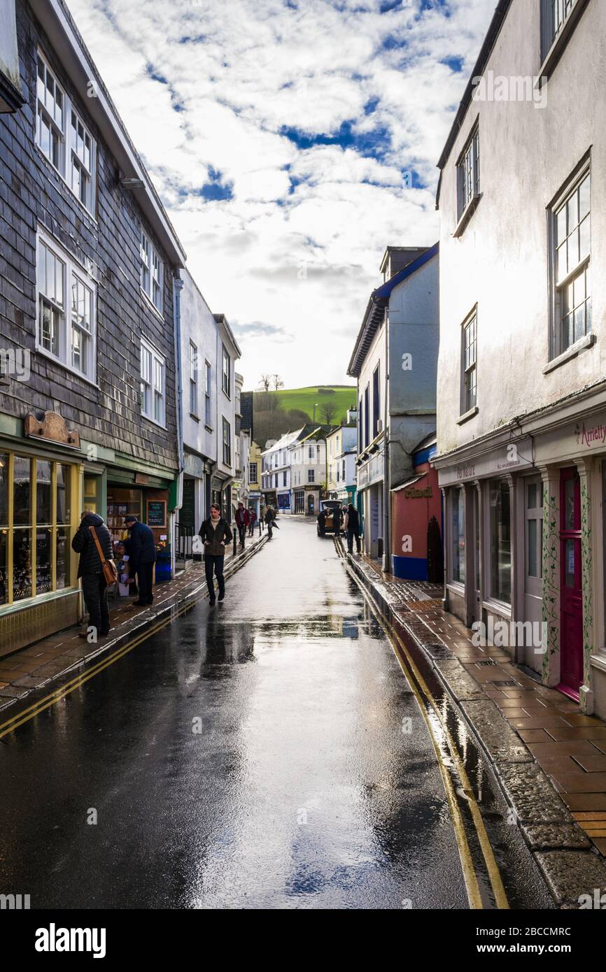 The upper section of Totnes' High Street contains several independent shops and restaurants.  Totnes, Devon, UK. Stock Photo