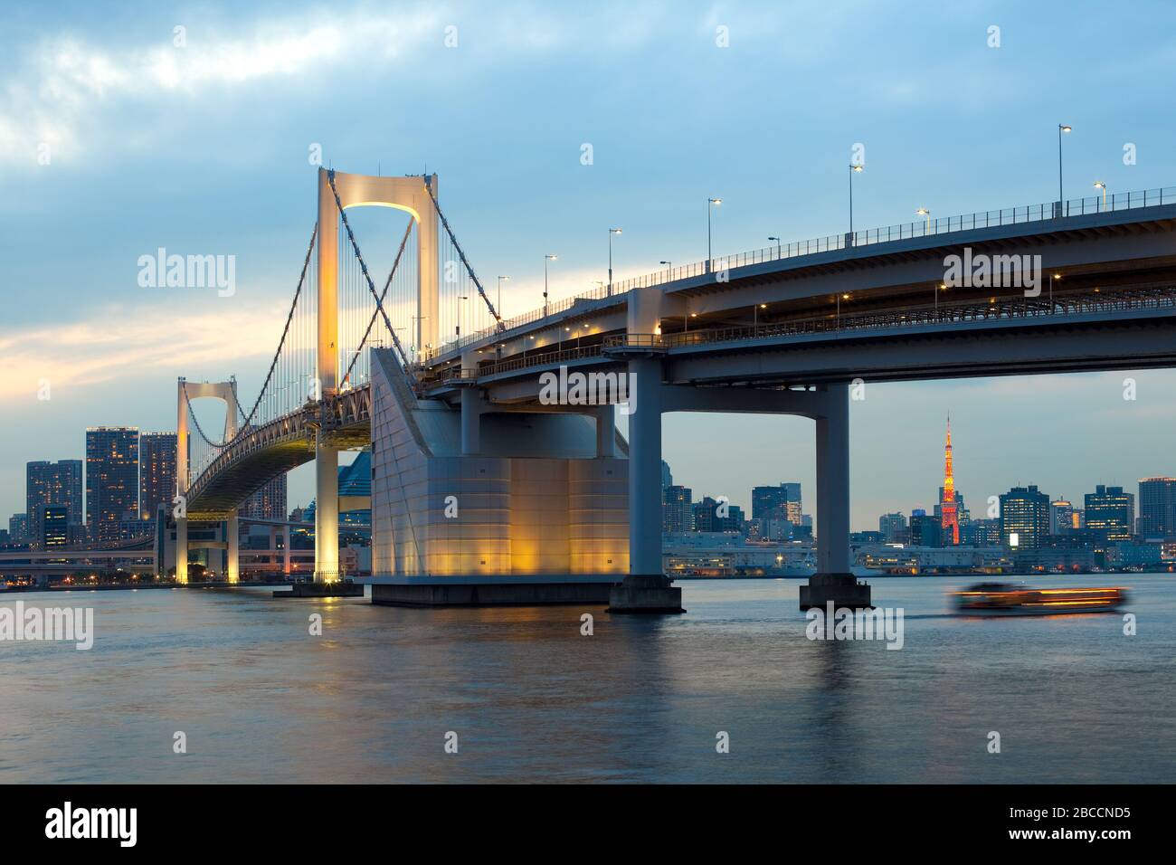 Rainbow Bridge and city skyline from Odaiba, Tokyo, Kanto Region, Honshu, Japan Stock Photo
