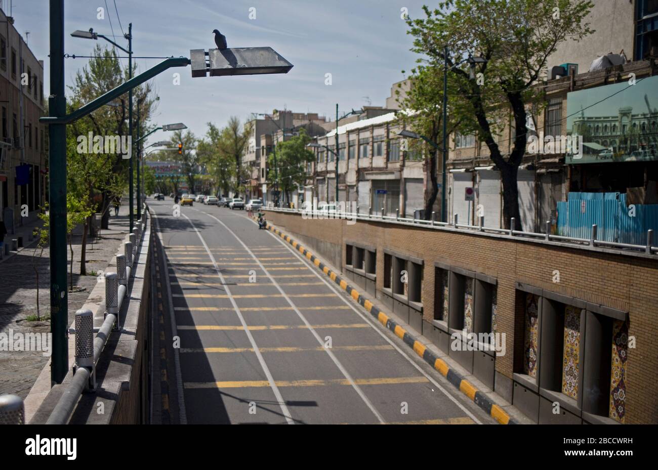 Iran. 3rd Apr, 2020. Photo taken on April 3, 2020 shows an empty street in Tehran, Iran. The number of confirmed cases of COVID-19 in Iran reached 55,743 on Saturday, with an increase of 2,560 in the past 24 hours, according to the latest figure from Iran Ministry of Health and Medical Education. Credit: Ahmad Halabisaz/Xinhua/Alamy Live News Stock Photo