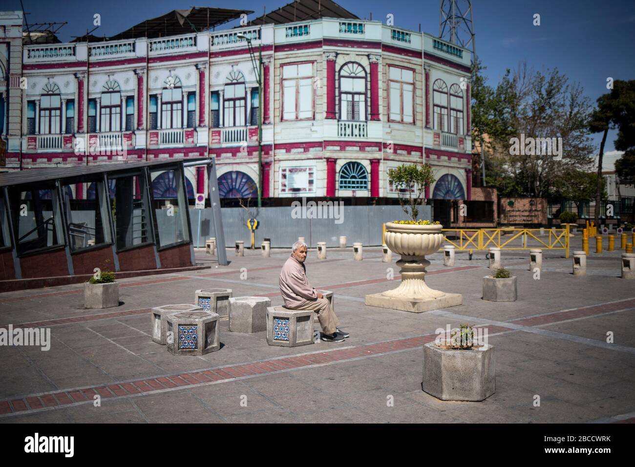 Iran. 3rd Apr, 2020. Photo taken on April 3, 2020 shows a man at an empty street in Tehran, Iran. The number of confirmed cases of COVID-19 in Iran reached 55,743 on Saturday, with an increase of 2,560 in the past 24 hours, according to the latest figure from Iran Ministry of Health and Medical Education. Credit: Ahmad Halabisaz/Xinhua/Alamy Live News Stock Photo