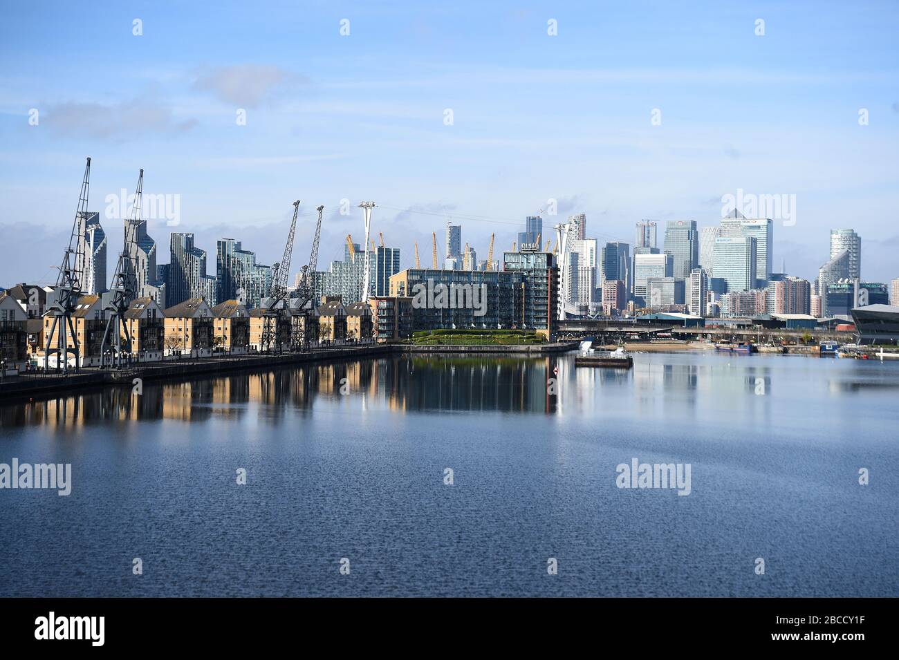 A view of the the Canary Wharf skyline and Royal Victoria Dock in ...