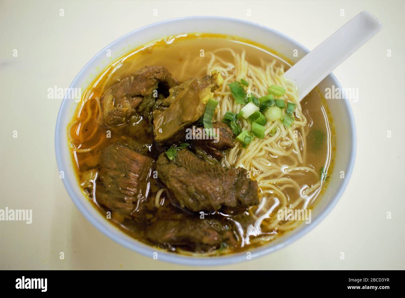 A bowl of curry beef brisket noodle soup in Macau, China Stock Photo
