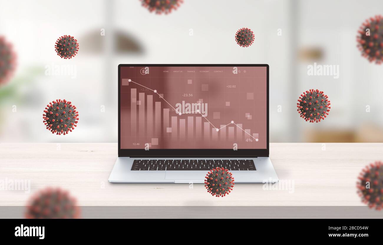 Decline in the stock market value shown at chart on laptop computer. Office desk concept surrounded by corona viruses Stock Photo