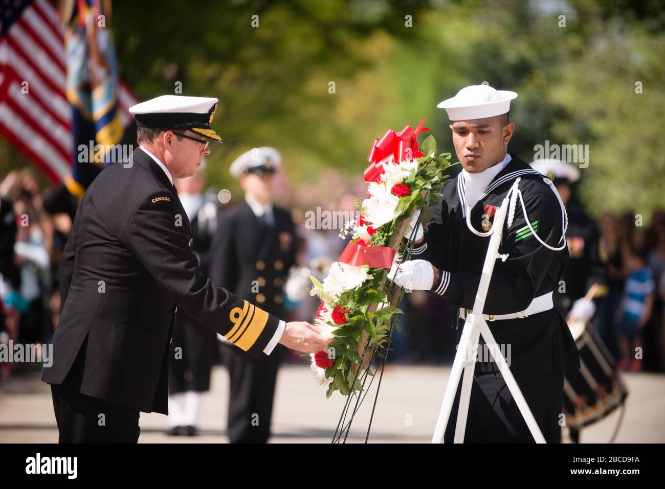 'Vice Adm. Mark Norman, commander of the Royal Canadian Navy, lays a wreath at the Tomb of the Unknown Soldier in Arlington National Cemetery, April 20, 2015, in Arlington, Va. Dignitaries from all over the world pay respects to those buried at Arlington National Cemetery in more than 3000 ceremonies each year. (U.S. Army photo by Rachel Larue/Released); 20 April 2015, 15:31; Commander of the Royal Canadian Navy lays a wreath at Tomb of the Unknown Soldier, Arlington National Cemetery; Arlington National Cemetery; ' Stock Photo