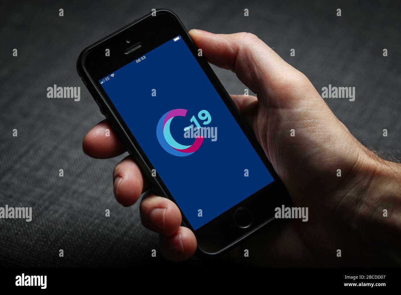 Covid sympton tracker app on an iPhone in the UK. Stock Photo