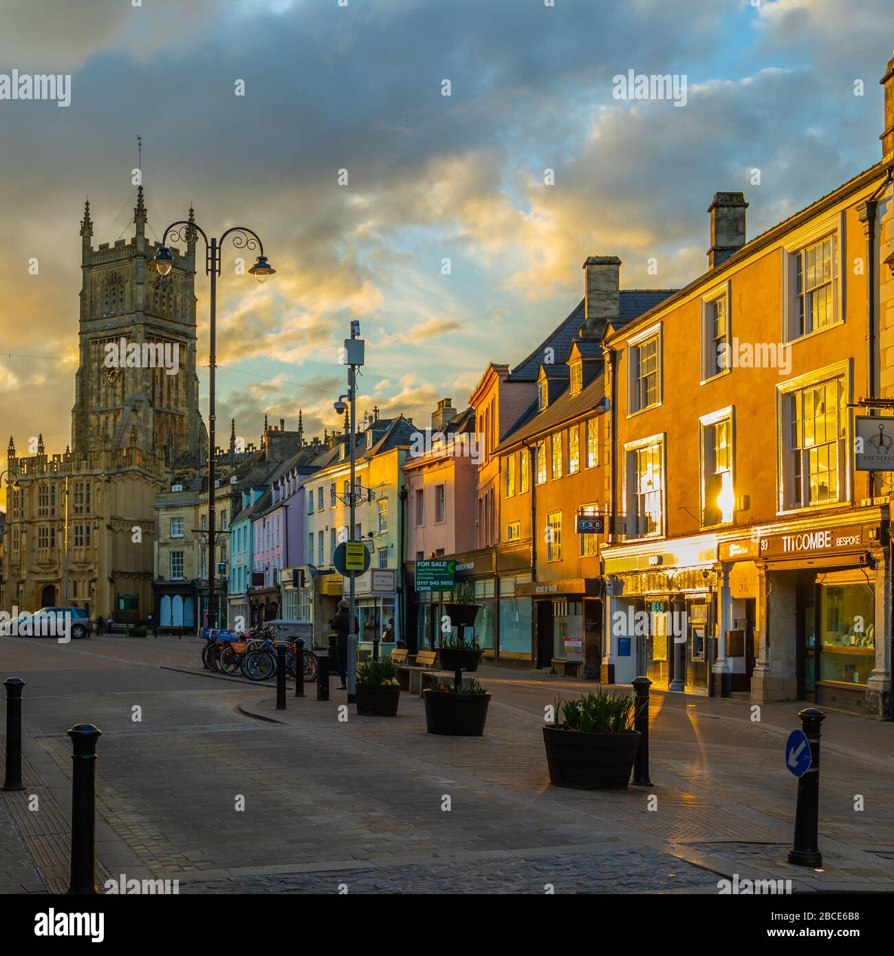 Pictures of Cirencester Market Place During The Coronavirus Covid -19 With The Sunsetting Hitting The Colourful Buildings.Capital of The Cotswolds . Stock Photo