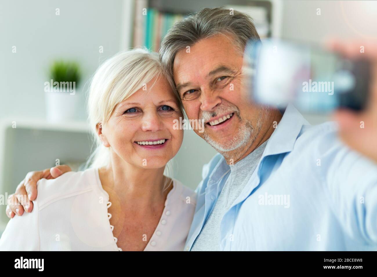 Senior couple taking selfie Stock Photo