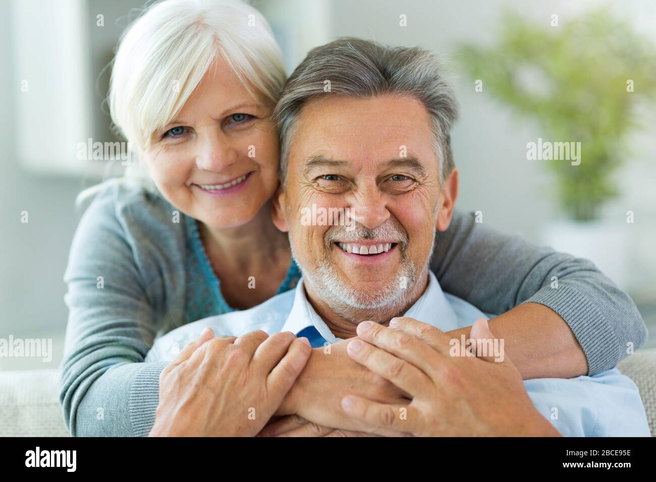 Senior couple relaxing at home Stock Photo - Alamy