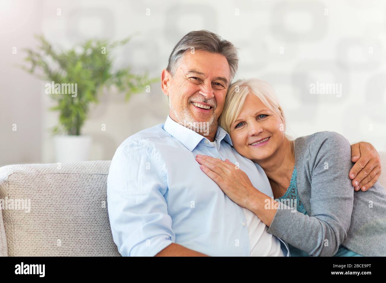 Senior couple relaxing at home Stock Photo - Alamy