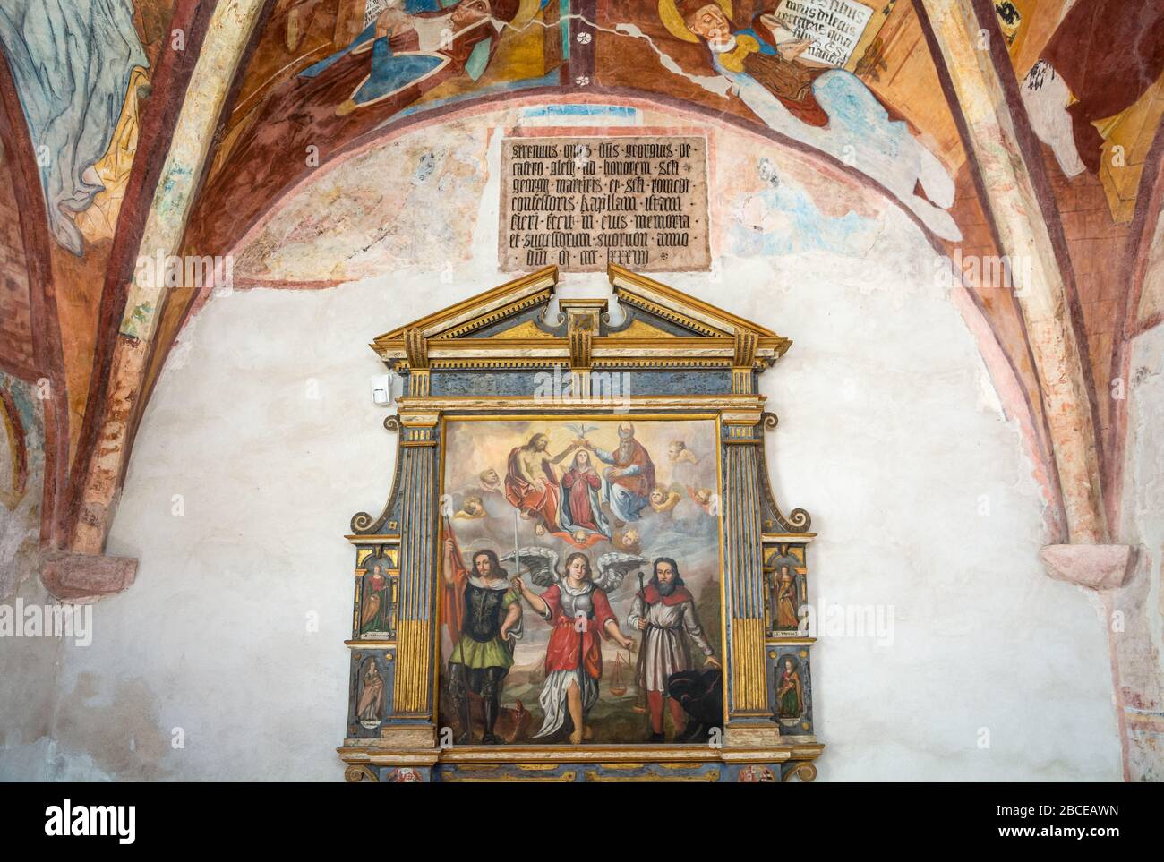 Sanctuary of San Romedio. Frescoes of the external walls of the Sanctuary. Non Valley,  Trentino Alto Adige, northern Italy - Trento province Stock Photo