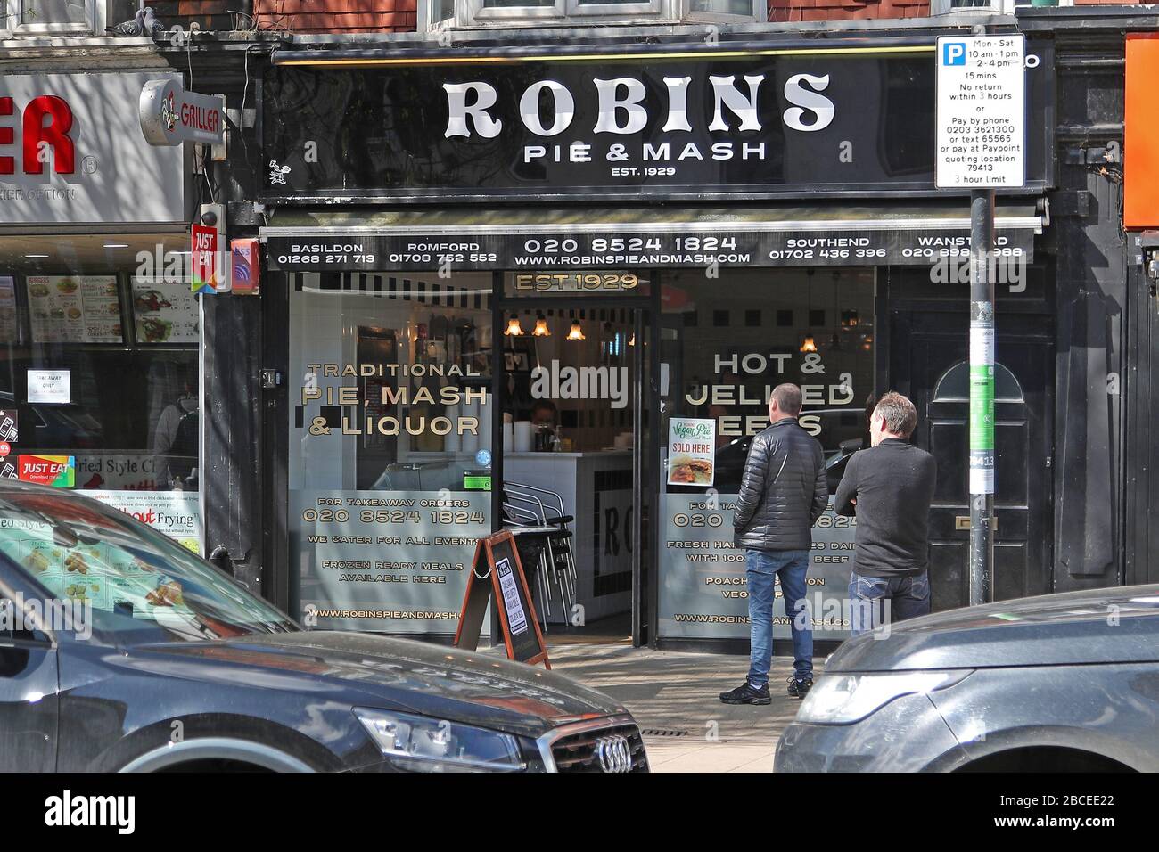Chingford, London, UK. 4th Apr 2020. Customers queue for takeaway Pie