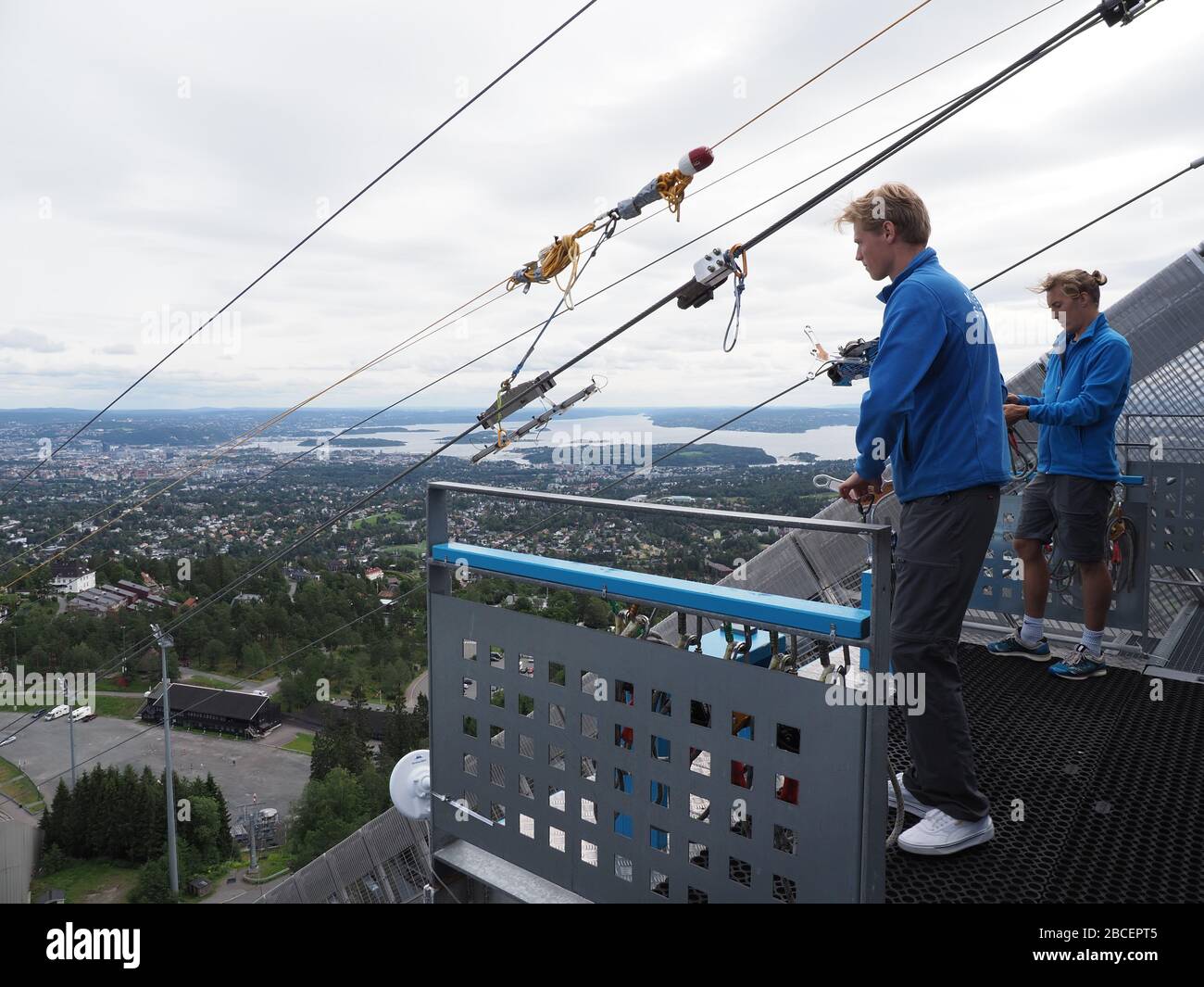Two People Care About Zipline Rider In European Oslo City Seen From Ski Jump In Holmenkollen District In Norway Stock Photo Alamy Two People Care About Zipline Rider In European Oslo City Seen From Ski Jump In Holmenkollen District In Norway Stock Photo Alamy