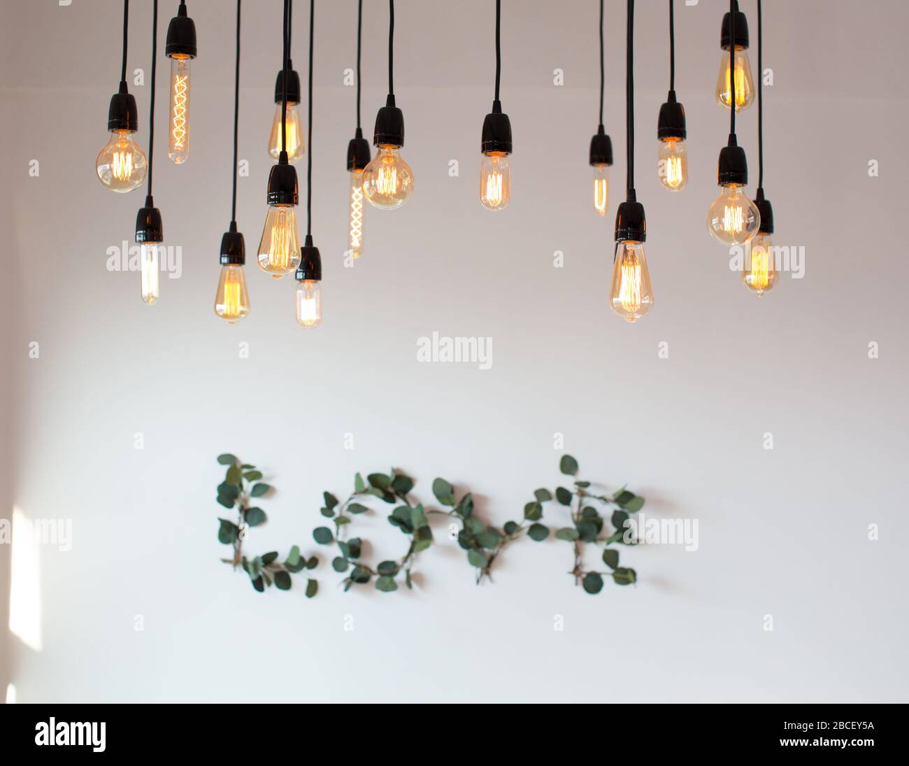 Set edison retro lamp on loft gray concrete background. Concept idea. Love. Warm. Stock Photo