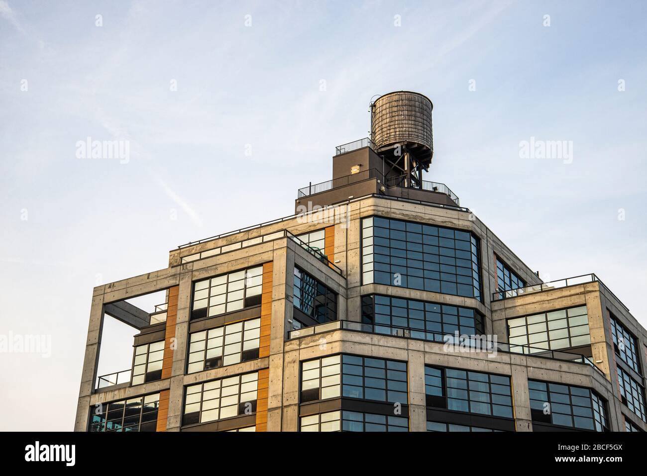 A water tank on top of a building Stock Photo Alamy
