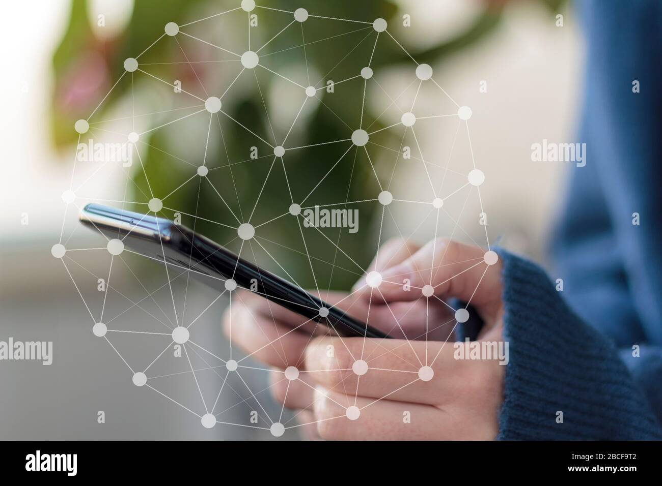 Woman using smartphone. Digital data network Stock Photo