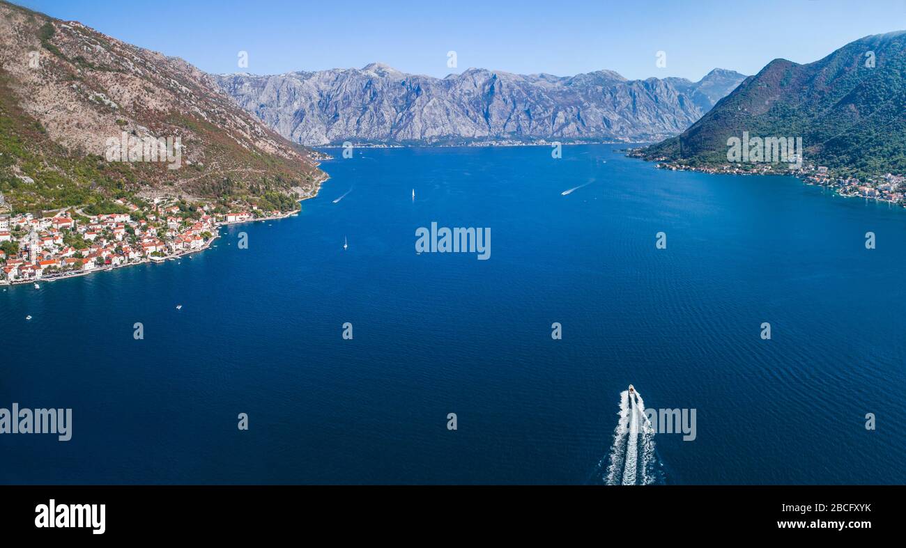 Aerial view of a boat walking and leaving a mark on the water Stock ...