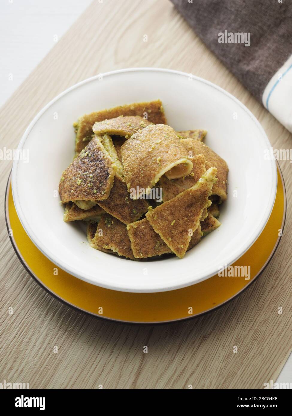 Testaroli al pesto souce, traditional ligurian pasta, Lunigiana, Ligury, Italy, Europe Stock Photo