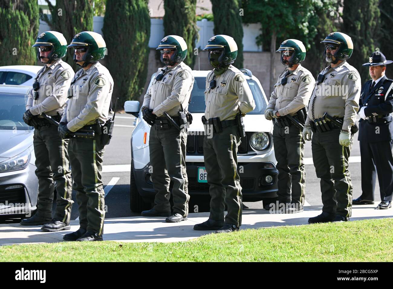 Covid protective equipment mortuary hires stock photography and images