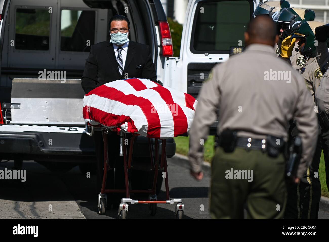 Covid protective equipment mortuary hires stock photography and images