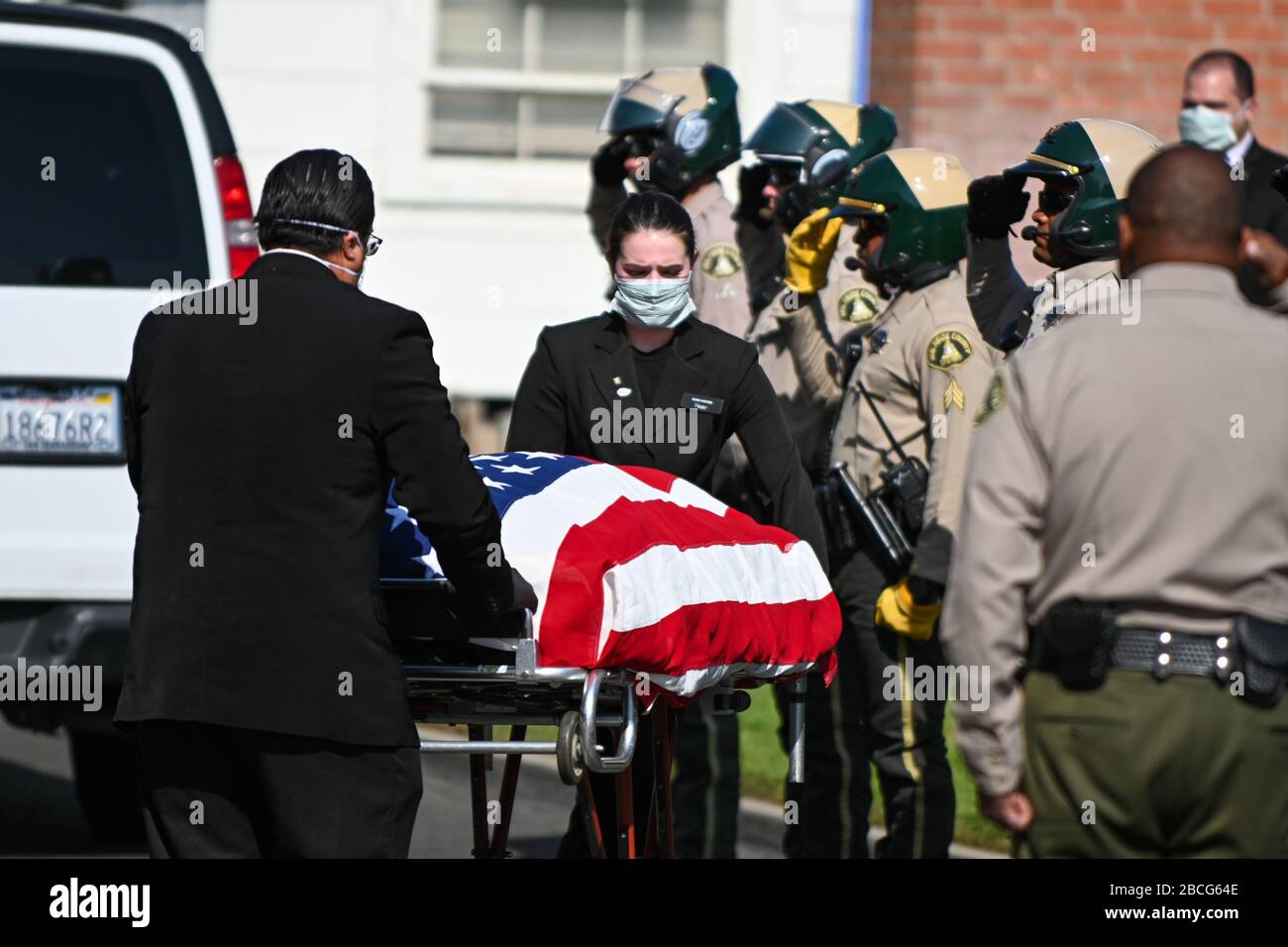 Covid protective equipment mortuary hires stock photography and images