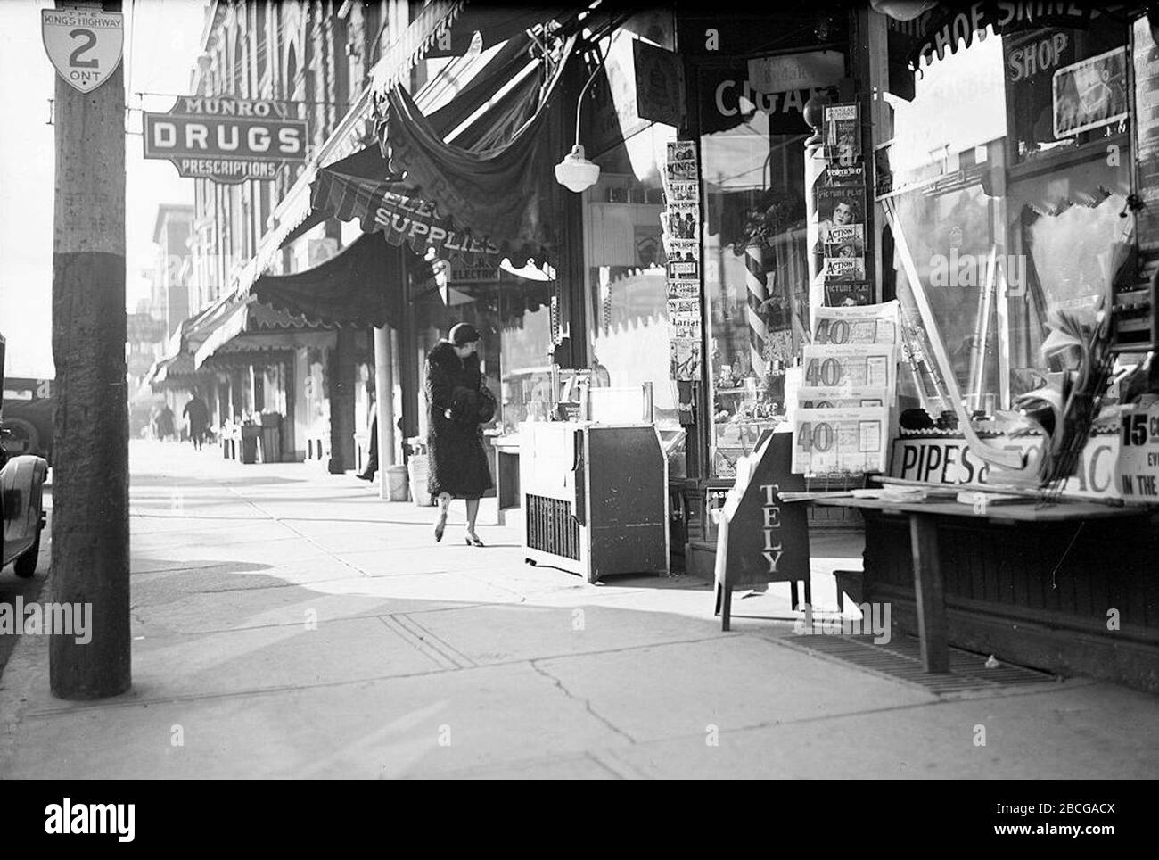 English Woman Wearing Muff Window Shopping At Stores In The