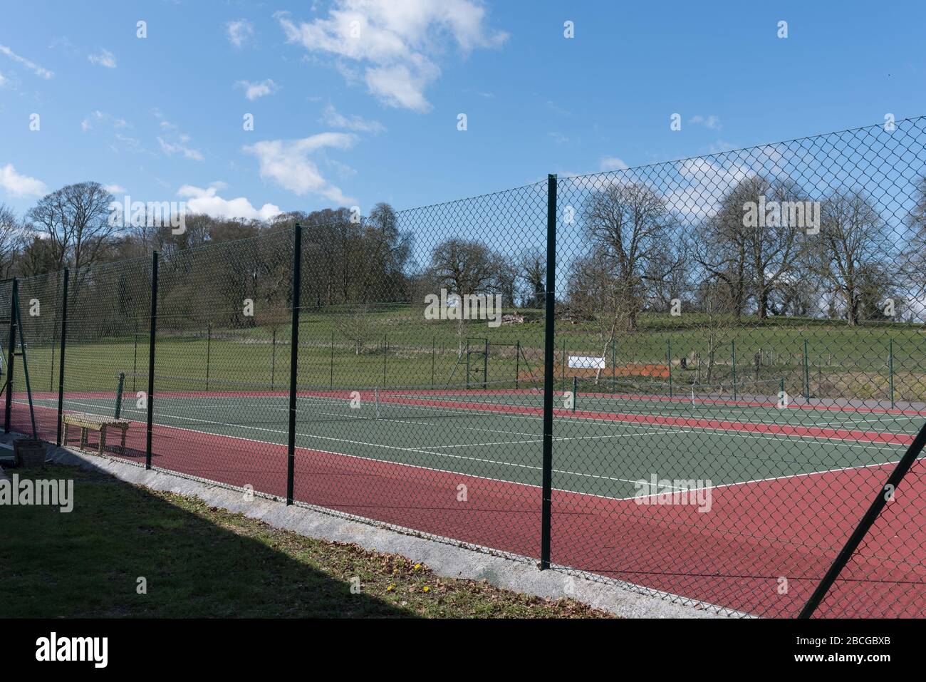 Tennis court empty  on lockdown forbidden to play on while virus alert Stock Photo