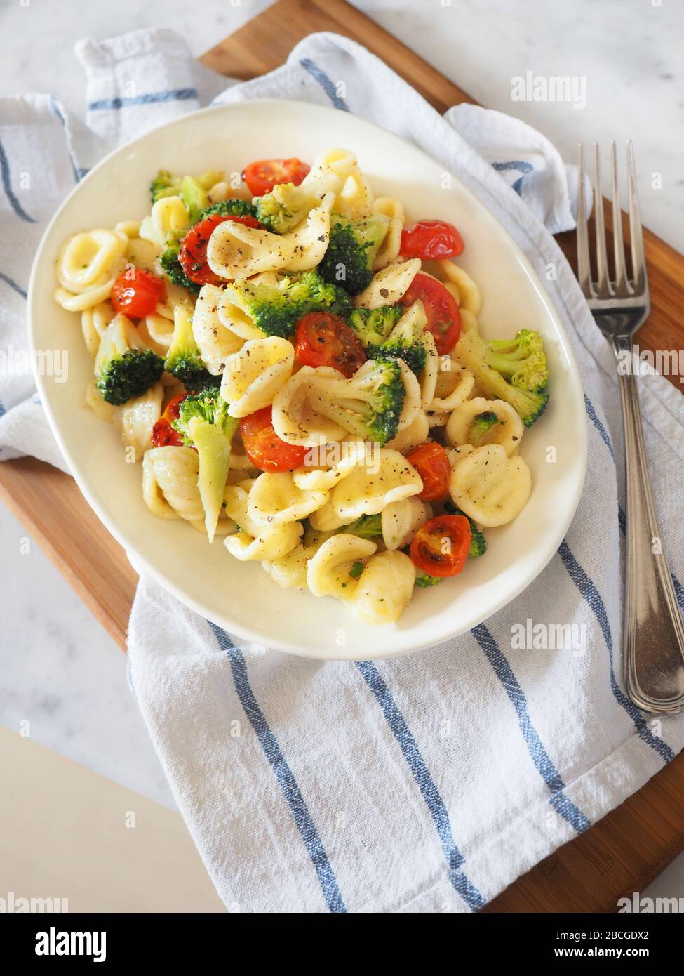 Orecchiette, typical apulian pasta with, cherry tomato Pachino, broccoli  and black pepper, Apuia, Italy, Europe Stock Photo - Alamy