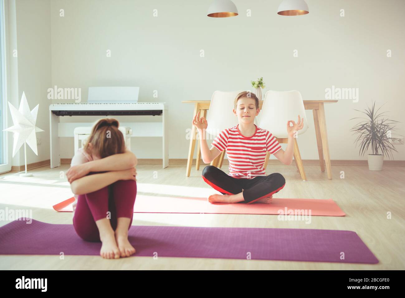 Children sitting exercise mat hi-res stock photography and images - Page 3  - Alamy