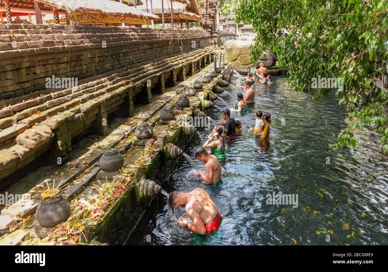 Indonesia, Bali, Tirta Empul; bath in the sacred spring; Stock Photo