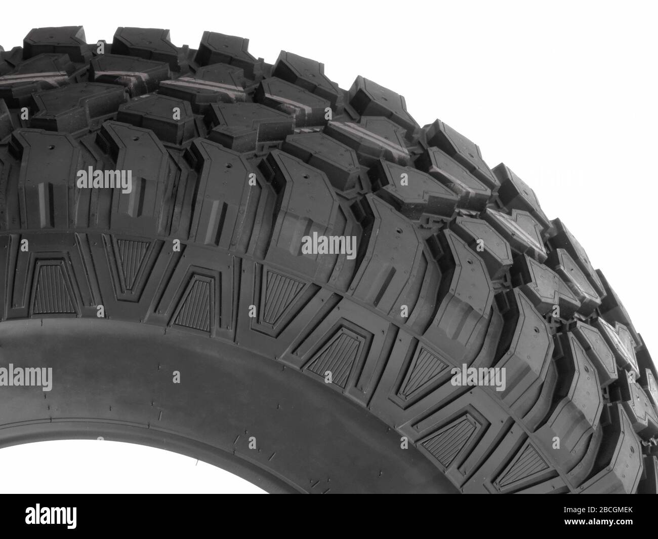 New Mud Truck Tire Tread Design And Deep Sipes Side View Stock Photo