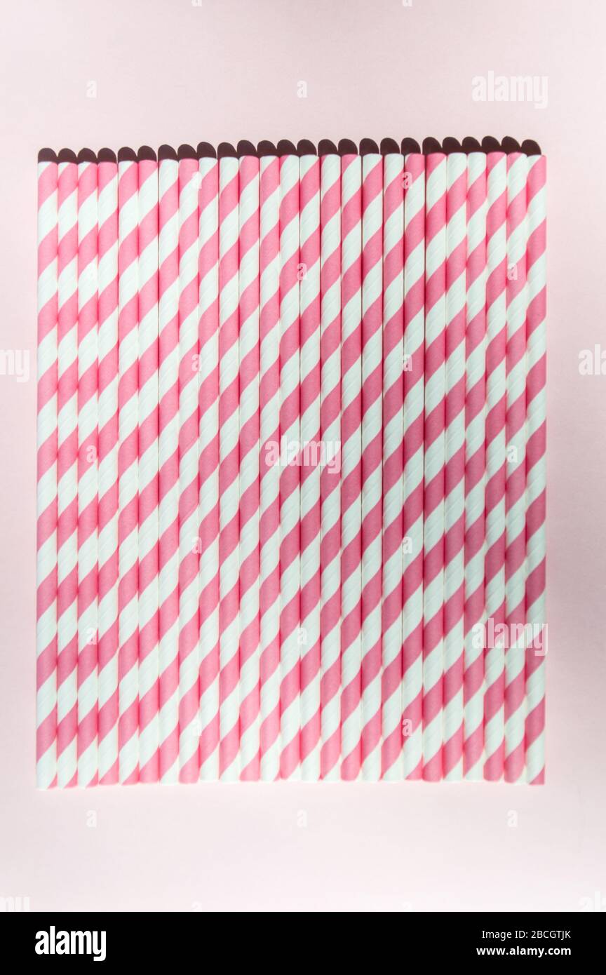 Paper straw in pink strip of retro style Stock Photo