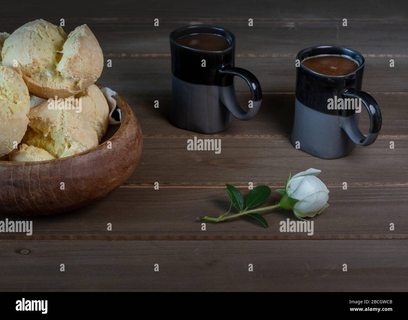 Closeup On Mouth Watering Brazilian Cheese Bread Pao De Queijo On Wooden Bowl Served With Coffee And Milk For Two On Wooden Background And Decorat Stock Photo Alamy Closeup On Mouth Watering Brazilian Cheese Bread Pao De Queijo On Wooden Bowl Served With Coffee And Milk For Two On Wooden Background And Decorat Stock Photo Alamy