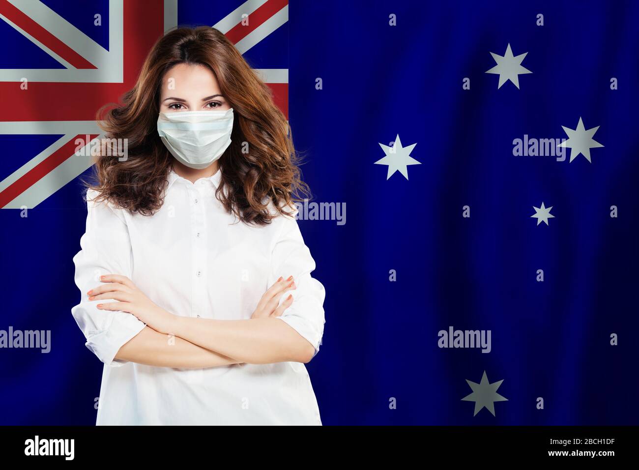Happy scientist, nurse or doctor in medical face mask on Australian