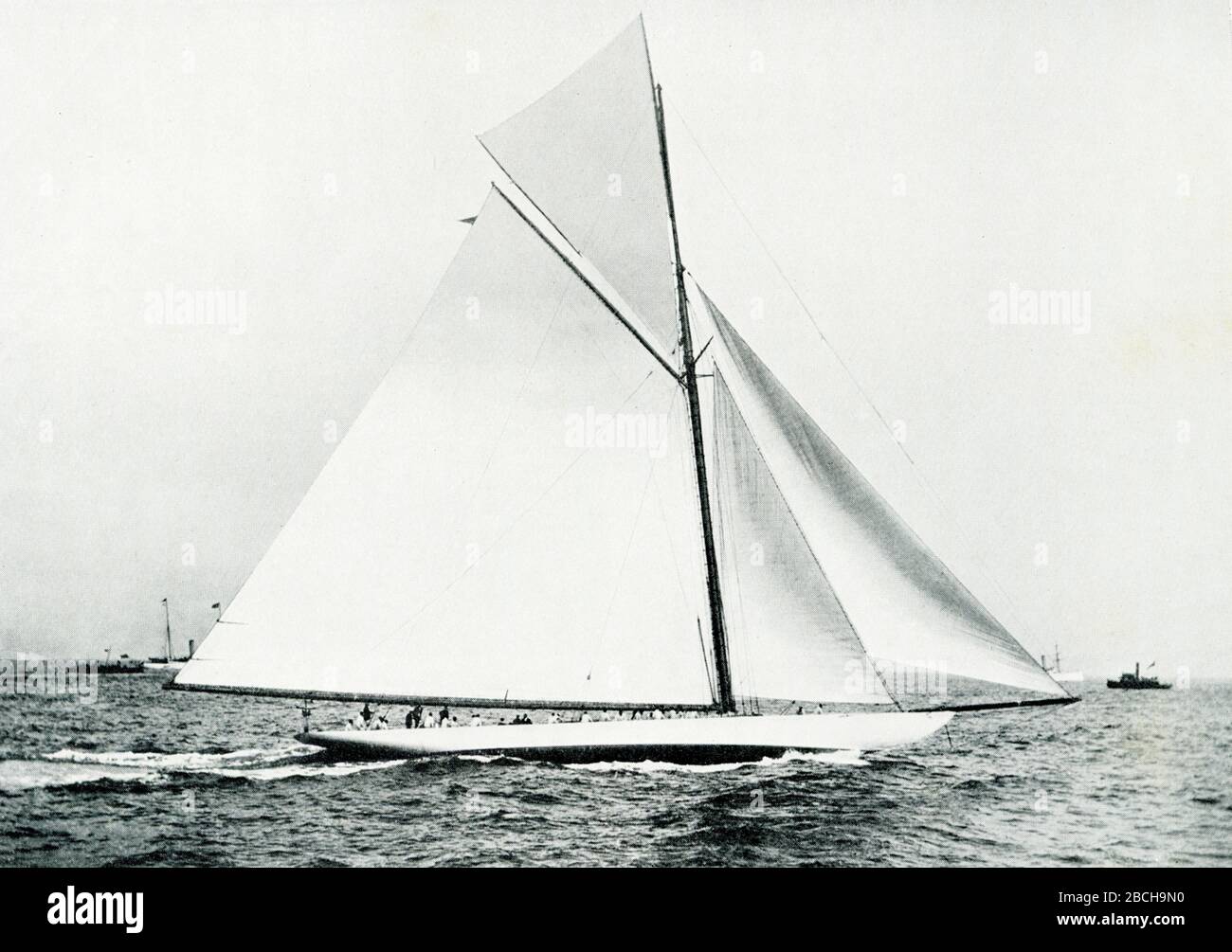 This photo shows the America Cup defender Columbia that was launched in 1899.  She was the defender of the tenth America's Cup race that same year against British challenger Shamrock as well as the defender of the eleventh America's Cup race in 1901 against British challenger Shamrock II. She was the first vessel to win the trophy twice in a row. The deisgner was Nathanael Greene Herreshoff. Stock Photo