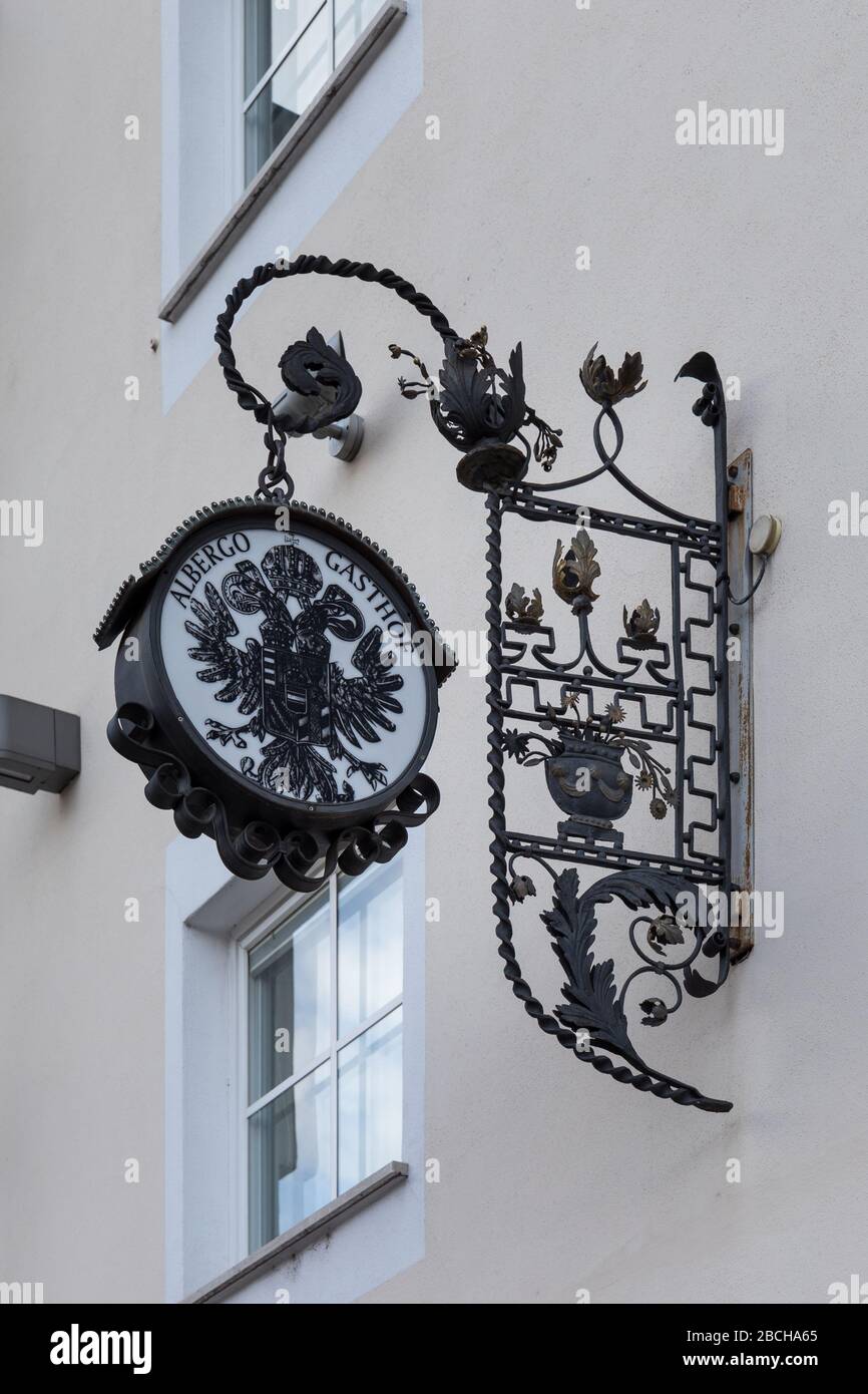 Double-headed eagle on sign of the inn in Brixen / Bressanone, South Tyrol, Italy Stock Photo