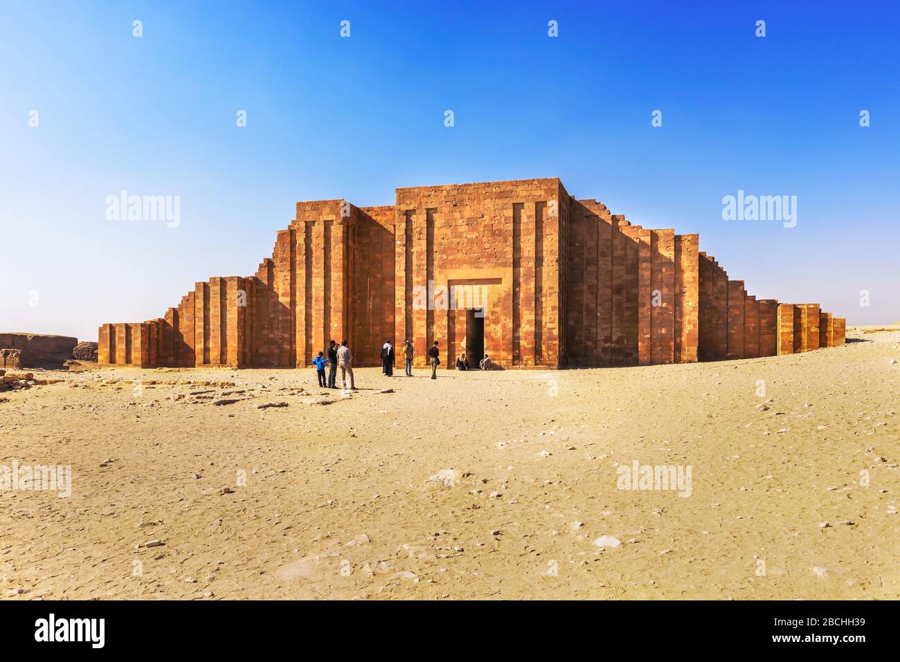 Saqqara, Egypt - December 31, 2014: Tourists in front of  the Saqqara Necropolis, which is a UNESCO World Heritage located near Cairo, Egypt Stock Photo