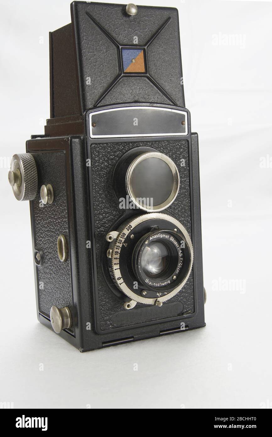 1930's vintage camera on a white background Stock Photo