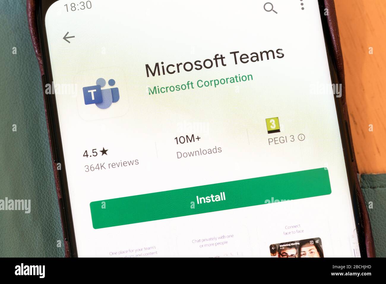 The Microsoft Teams video conferencing application (app) install screen on a smartphone screen Stock Photo