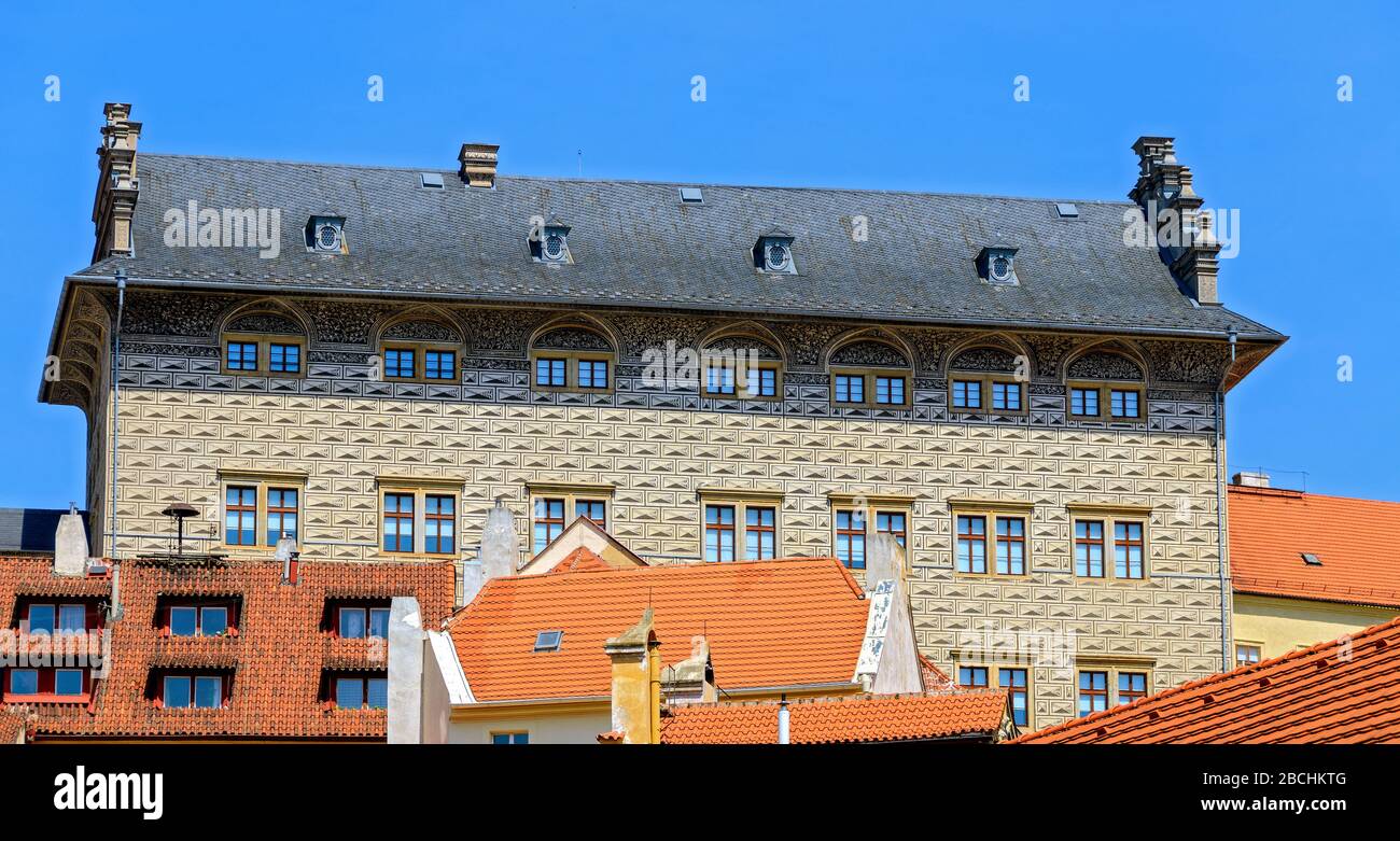 historic palace Schwarzenberg above modern residential buildings in Prague, Czech Republic Stock Photo