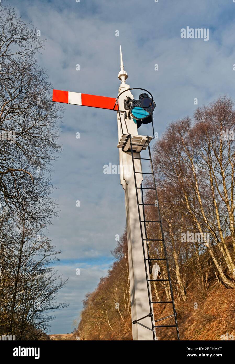 Old traditional railway signal at a points junction in the countryside Stock Photo