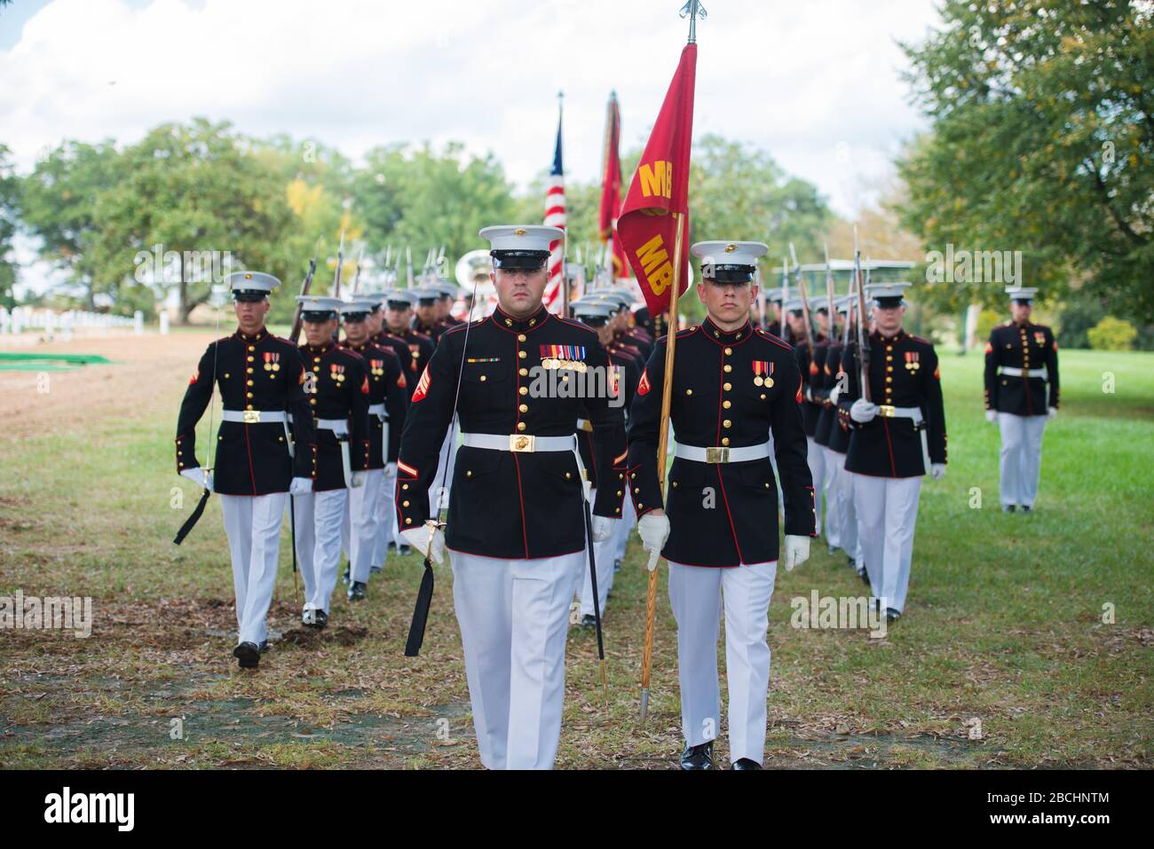 'Marines from Marine Barracks, Washington, D.C. (8th and I) participate in the full honors funeral of U.S. Marine Corps 2nd Lt. George S. Bussa in Section 60 of Arlington National Cemetery, Arlington, Va., Oct. 10, 2017.  In November 1943, Bussa was assigned to Company F, 2nd Battalion, 8th Marines, 2nd Marine Division, which landed against stiff Japanese resistance on the small island of Betio in the Tarawa Atoll of the Gilbert Islands, in an attempt to secure the island. Over several days of intense fighting at Tarawa, approximately 1,000 Marines and Sailors were killed and more than 2,000 w Stock Photo