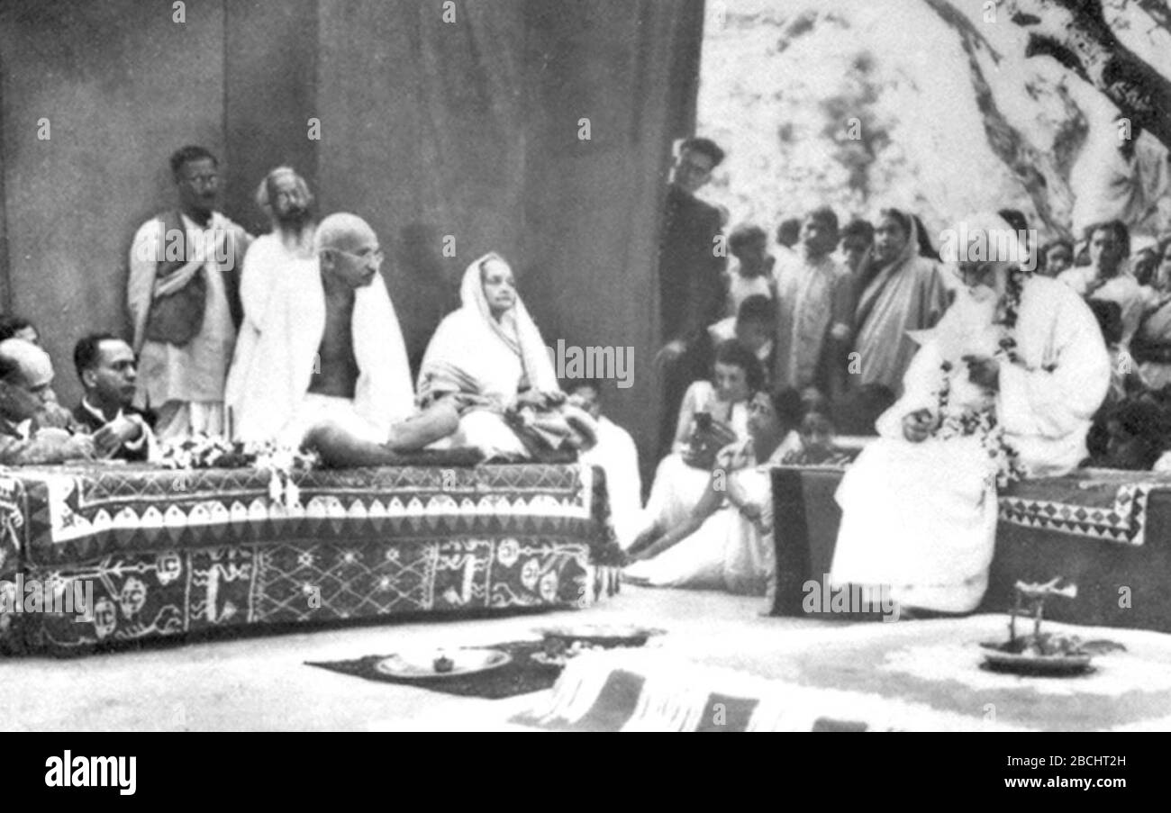 'Gandhi and Kasturba at Shantiniketan visiting Rabindranath Tagore.; 1940; http://web.mahatma.org.in/pictures/images/piccat0001/le 1024 0027.jpg; Unknown author; ' Stock Photo