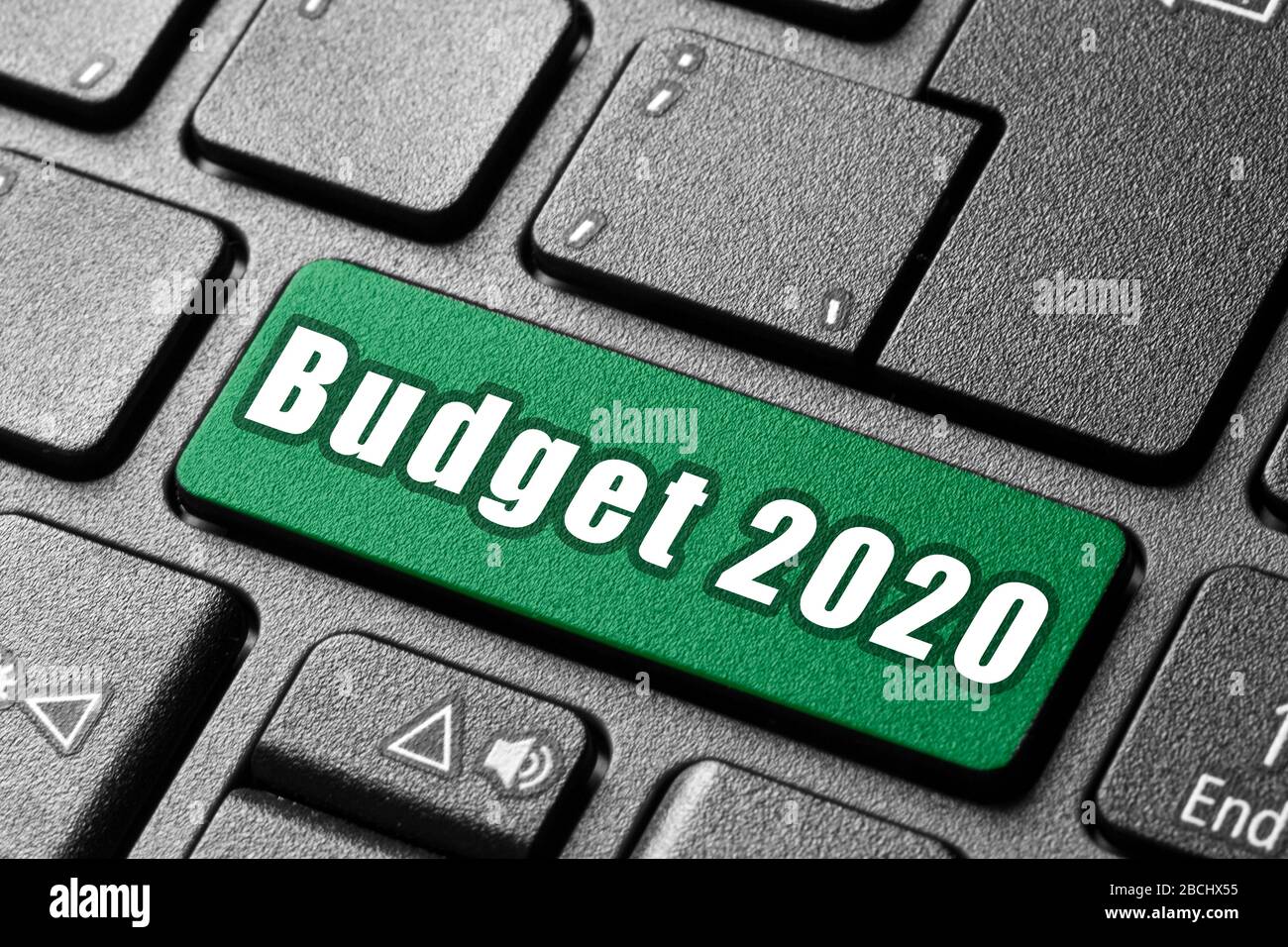 budget 2020 pc keyboard button pushing a single word Stock Photo - Alamy